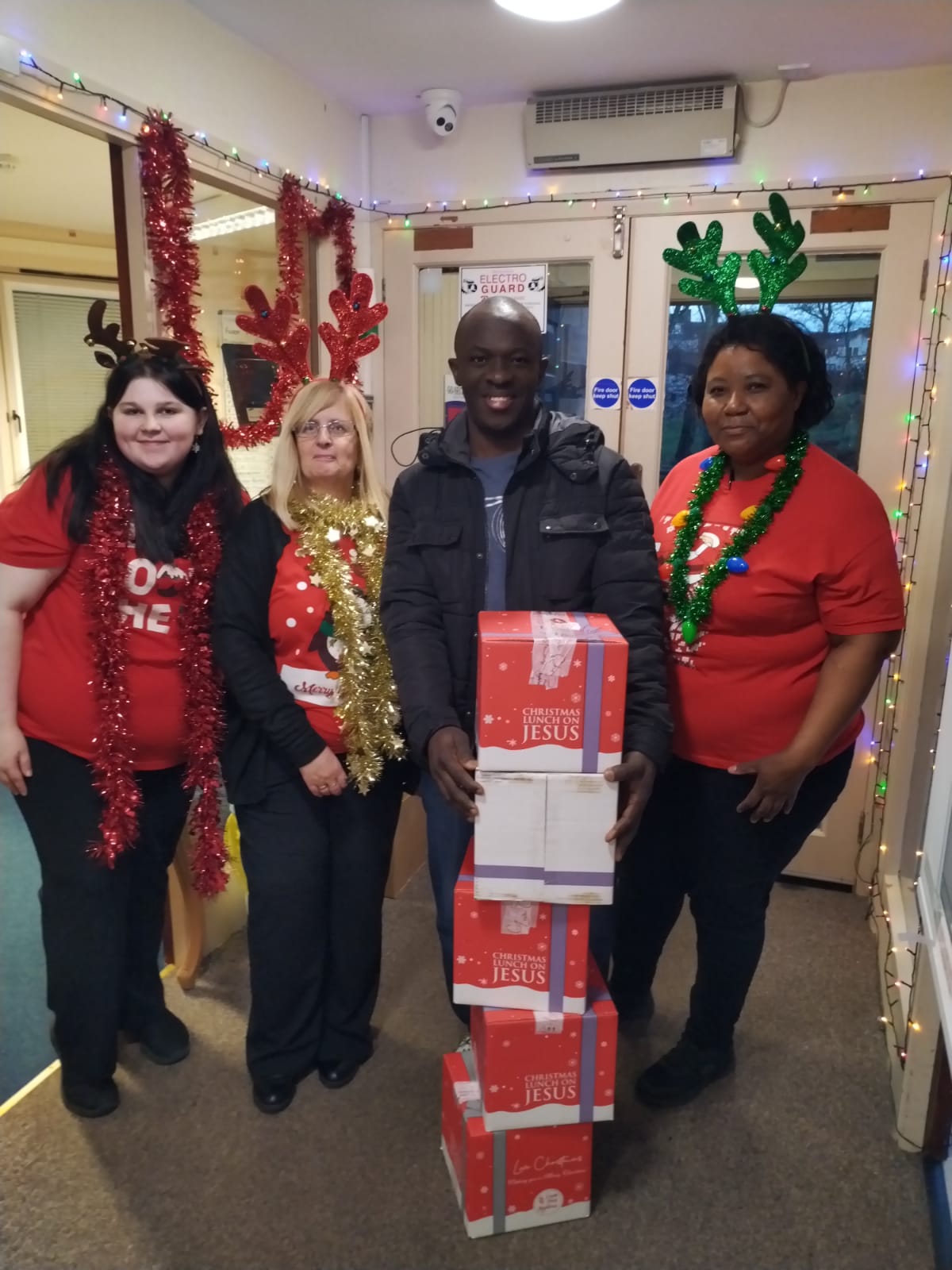 Christmas gifts being delivered to a community partner
